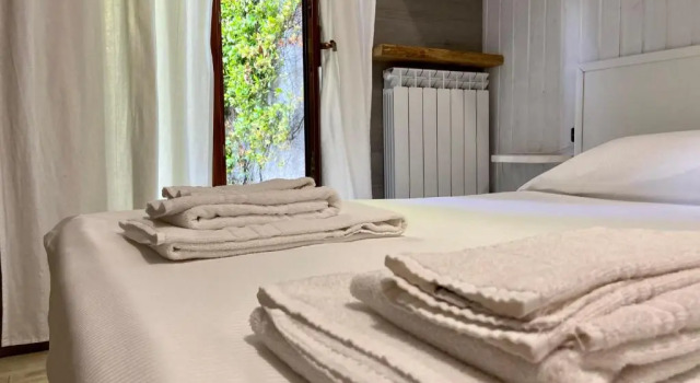 Апартаменты Appartamento con vista sul lago di Iseo e piscina