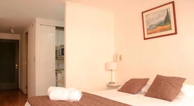 Студия с балконом Apartamentos Costanera Centre