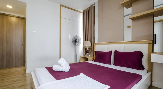 Номер Deluxe с балконом и с видом на город Christina's Saigon - Icon 56 Apartment