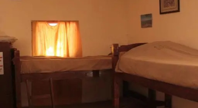 Кровать в общем номере Hostel Ibirapita