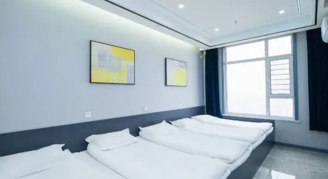 Кровать в общем номере Nikko Green Hotel Natsukashiya Fuwari