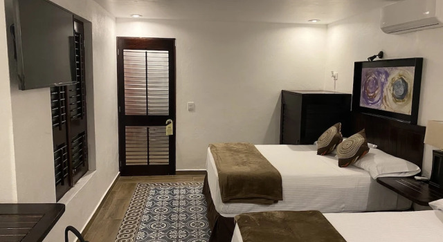 Четырёхместный номер Deluxe Hotel Raices de Mar