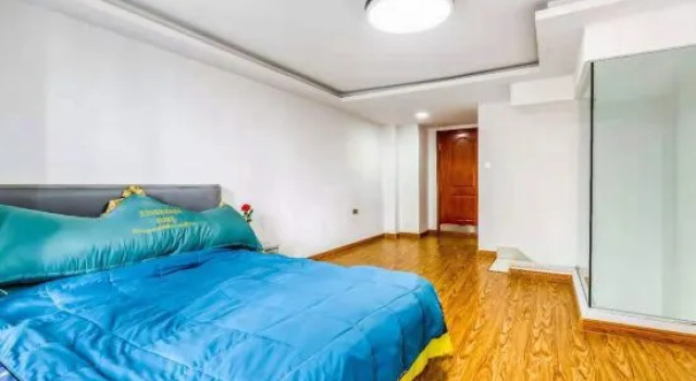 Кровать в общем номере Harbin Yuanbo'ao Hotel Apartment (Xingguangyao Branch)