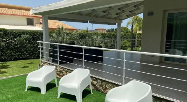 Апартаменты Borgo Aranci - Appartamento in Villa Orchidea - 12A