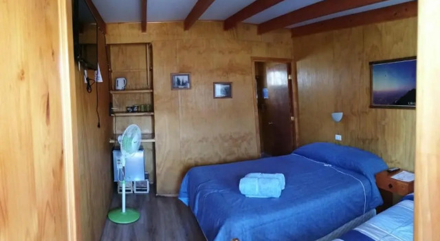 Четырёхместный номер Standard с красивым видом из окна Hostal El Colibri