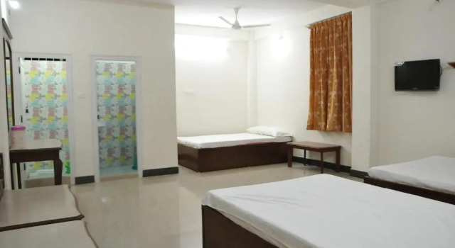 Кровать в общем номере MYSORE MAHALAKSHMI ROOMS