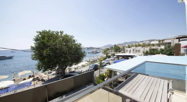 Апартаменты Seafront Flat With Breathtaking Sea View in Bodrum