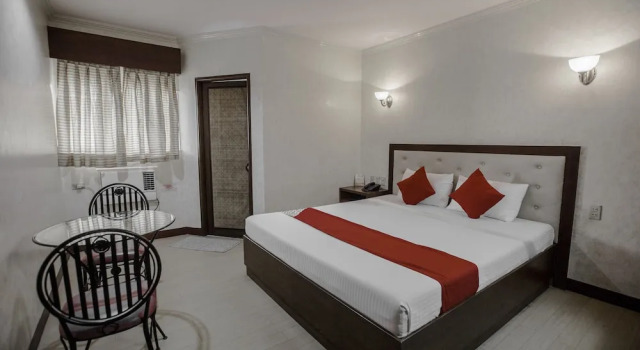 O podwyższonym standardzie pokój Capital O 740 Bliss Hotel Dau