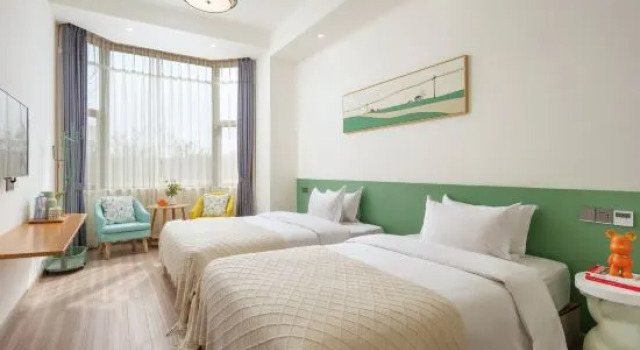 Кровать в общем номере с 6 комнатами Mogan Shanshui Moxipan Wild Luxury Villa Countryside Beauty