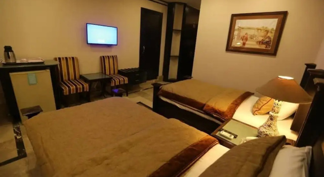 Deluxe Triple room City Centre Suites