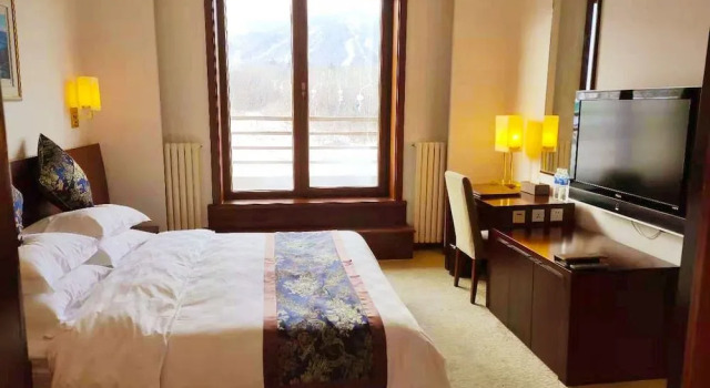Avaunce Yabuli Hotel, Prenota Hotel Zhenzhushan Cina