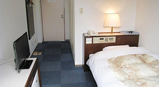 Кровать в общем номере (мужской номер) Hotel Higashihiroshima Hills Saijo