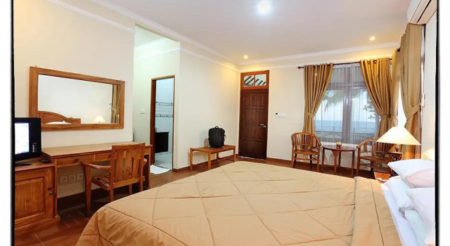 Mascot Beach Resort by OYO Rooms, Забронировать Курортный отель Курортные отели Сенггиги, рядом с Плаж Сенггиги, Курортный отель