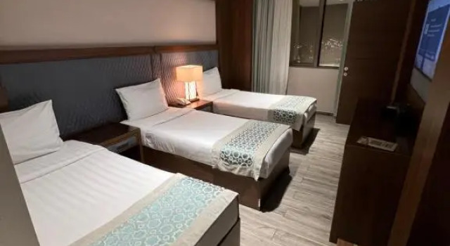 Трёхместный номер Violet Al Shisha Hotel