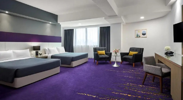 Четырёхместный номер Executive RELC International Hotel