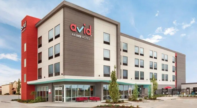 Кровать в общем номере avid hotel Oklahoma City – Yukon by IHG