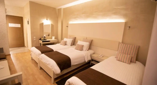 Трёхместный номер с видом на море Nidimos Hotel