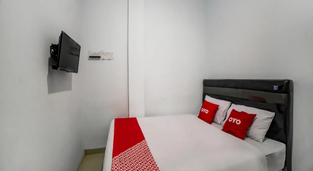 Hotel O Ada Guest House, Rezerwuj Pensjonat Medan Sumatra