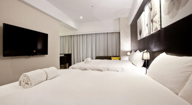 Standardowy czteroosobowy pokój StayInn Taipei