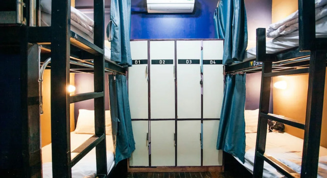 Кровать в общем номере D-Well Hostel