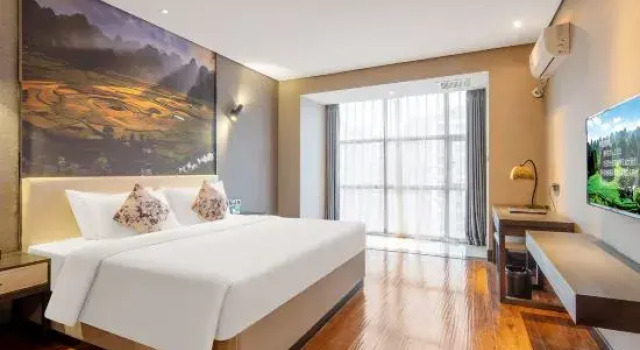 Люкс Deluxe Xingyi Bast Dreamland Hotel
