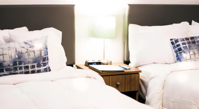 Четырёхместный номер Deluxe Blue Sage Inn & Suites