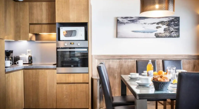 Кровать в общем номере Chalet des Neiges