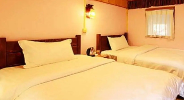 Lijiang Mengzhiju Hotel, Забронировать Отель Лицзян Юньнань, рядом с Улица Сквер-стрит Древнего города Даянь
