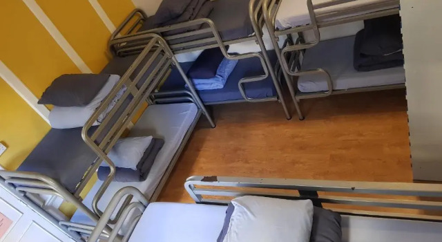 Кровать в общем номере Bath Backpackers