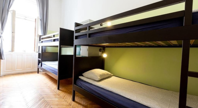 Кровать в общем номере Spicy Hostel