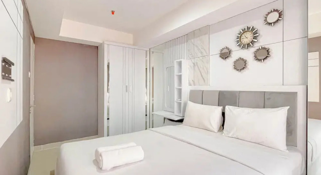 Апартаменты Standard Grey Toned 1Br Apartment Tamansari Skylounge Makassar