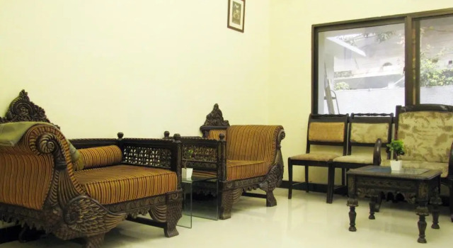 Dhimi Lodges, Reservar Hotel Gulberg Lahore