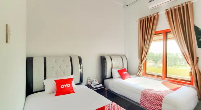 OYO 3844 Shinta Guesthouse, Rezerwuj Hotel Medan Sumatra