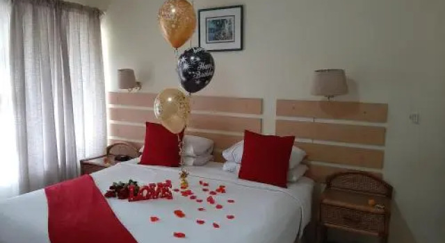 Shelly Beach Lodge, Забронировать Отель Отели Шелли-Бич с парковкой, рядом с Торговый центр South Coast Mall, Парковка