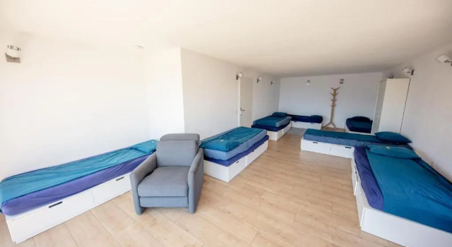 Кровать в общем номере Young Backpackers Homestay