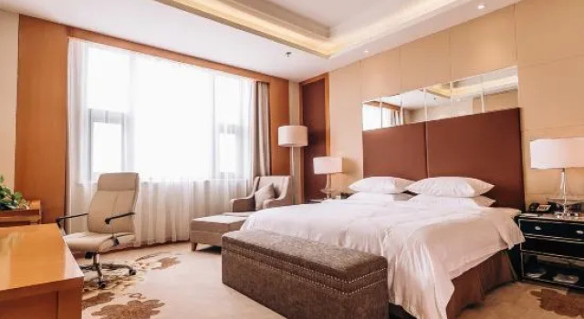 Люкс Deluxe Zhenhua Xinyue International Hotel