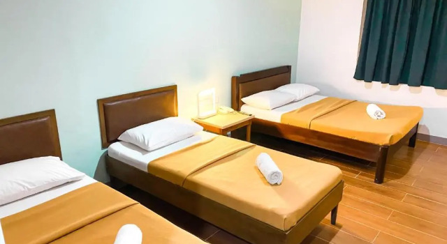 Четырёхместный семейный номер Standard Metro Pines Inn