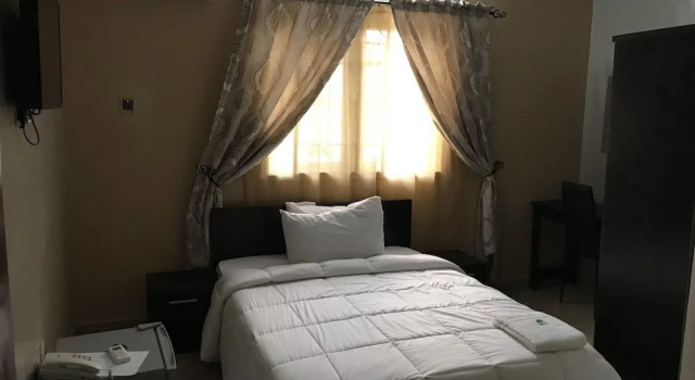 Unifirst hotel & suites