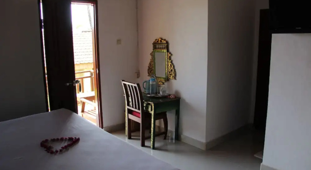 Номер Deluxe с балконом Puri Bunga Beach Cottages