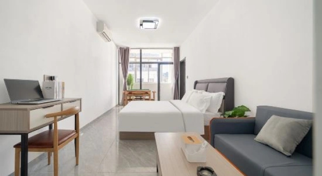 Четырёхместный семейный люкс Superior с балконом Xiamen Laer Serviced Apartment