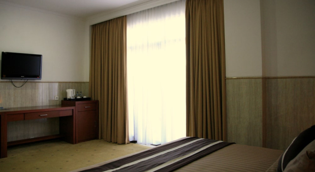 Номер Deluxe c 1 комнатой с балконом Bali Paradise City Hotel