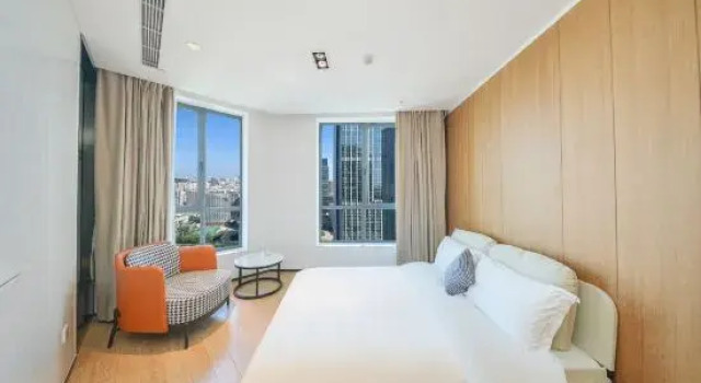 Семейный люкс с 2 комнатами Yuelan Seaview Hotel Apartment (Qingdao May Fourth Square China Railway Center)