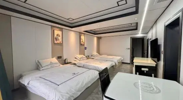 Кровать в общем номере Zhenyuan Cai's Residence