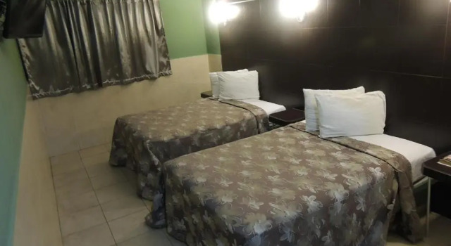 Четырёхместный номер Deluxe Hotel Metropolitano Tampico