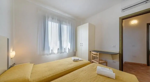 Семейные апартаменты с балконом и с видом на бассейн Residenza Le Farfalle