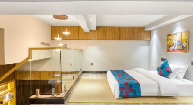 Люкс Yichenwei Binjiang Hotel (Xishuangbanna Splashing Plaza)