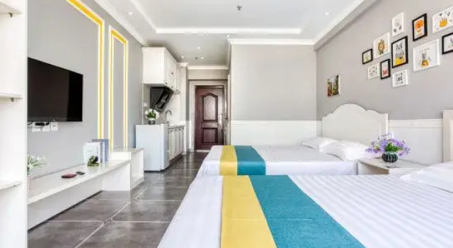 Кровать в общем номере Haiduo Homestay (Baishawan Branch)