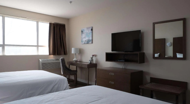 Четырёхместный номер Standard Hotel Montreal Metropolitan, an Ascend Collection Hotel