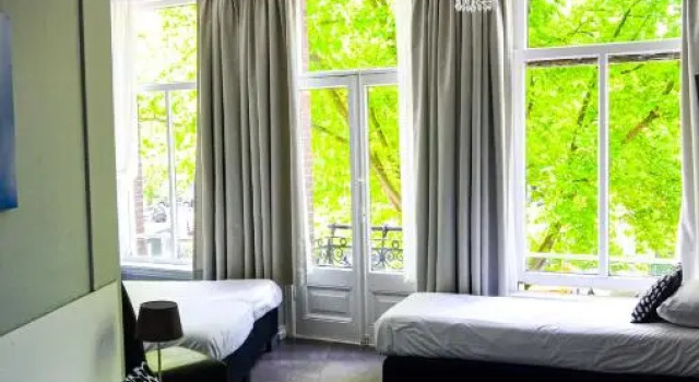 Кровать в общем номере Family Hotel Kooyk