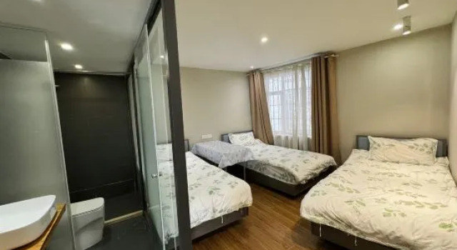 Łóżko w pokoju wieloosobowym (pokoju wieloosobowym żeńskim) Fengma Feiyang Hostel